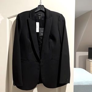 Never been worn, tags on.